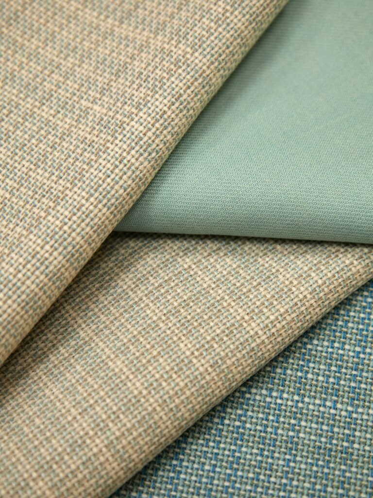 Woven fabric swatches in sage and sand